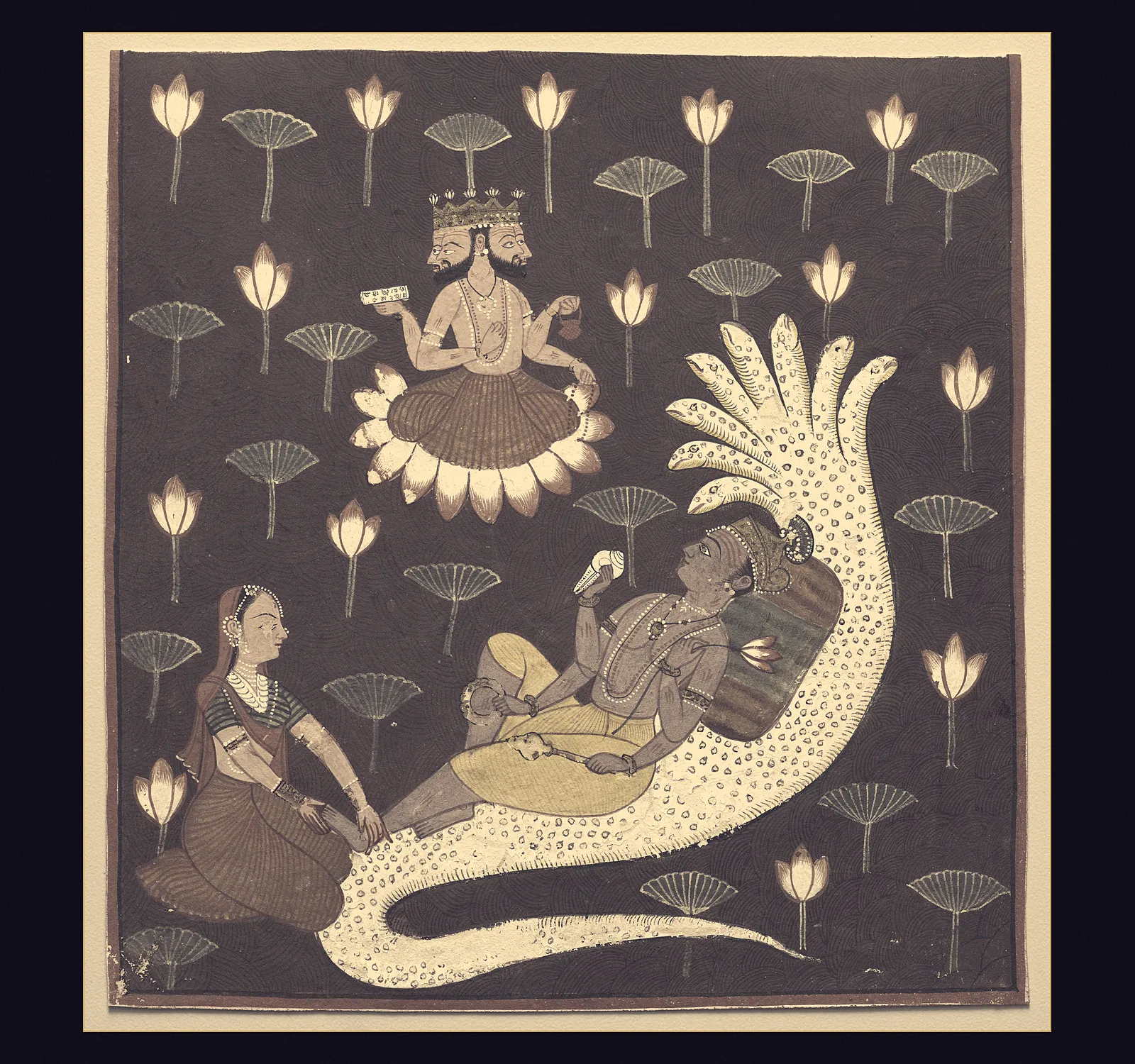 Vishnu reclining on the serpent Ananta with Lakshmi at his feet and Brahma seated on a lotus above, a Pahari painting on a dark ground scattered with lotuses